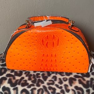 Orange embossed ostrich print 2 way satchel
